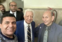 مرتضى منصور والدكتور حسين المطعنى